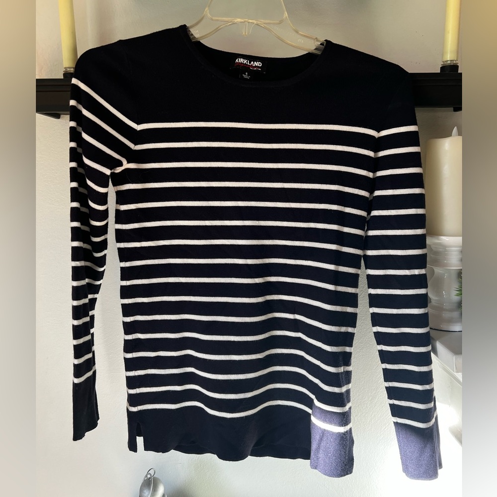 Women’s sweater.  Size small.  Color is dark blue and white